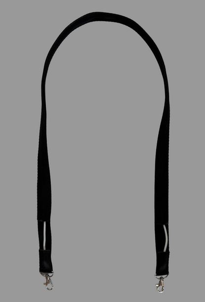 A black fabric camera strap with silver metal lobster clasps on both ends, laid flat on a white tiled surface.